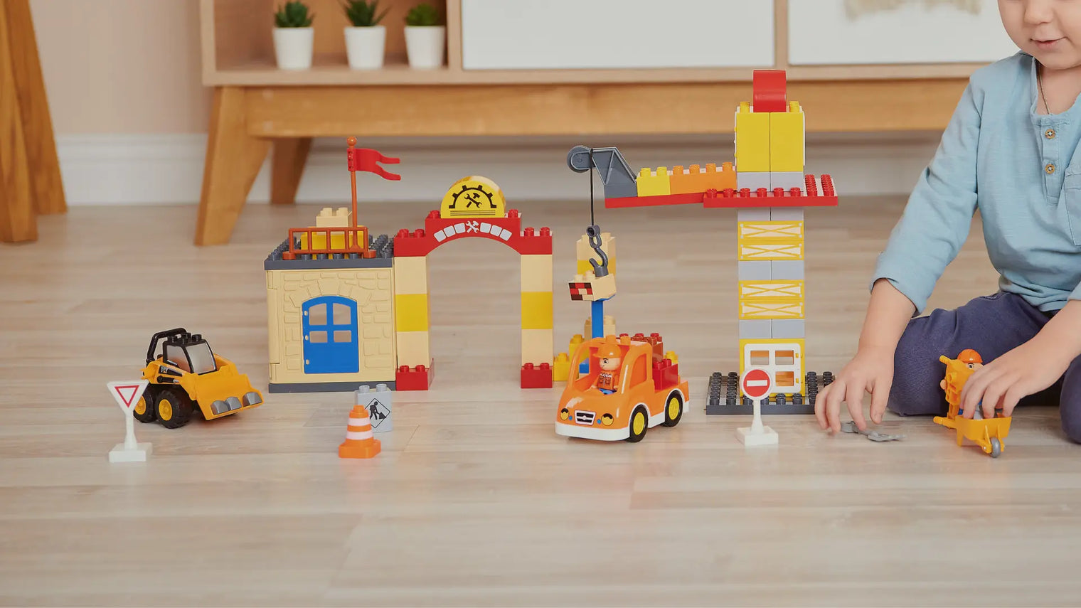 Little boy playing with a STEM learning toy