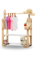 Load image into Gallery viewer, Handcrafted 30-inch wooden clothing rack, featuring a variety of children's clothing and accessories. The rack holds vibrant purple, pink, and white T-shirts on natural wood hangers. A woven straw hat with a multicolored band adorns the top shelf, alongside a playful straw basket embellished with fruit motifs. A pair of chic pink toddler boots and a plush llama toy with a colorful necklace grace the bottom shelf. Perfect for organizing and displaying kids' fashion