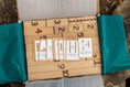 Load image into Gallery viewer, Montessori wooden number blocks with flashcards in packaging