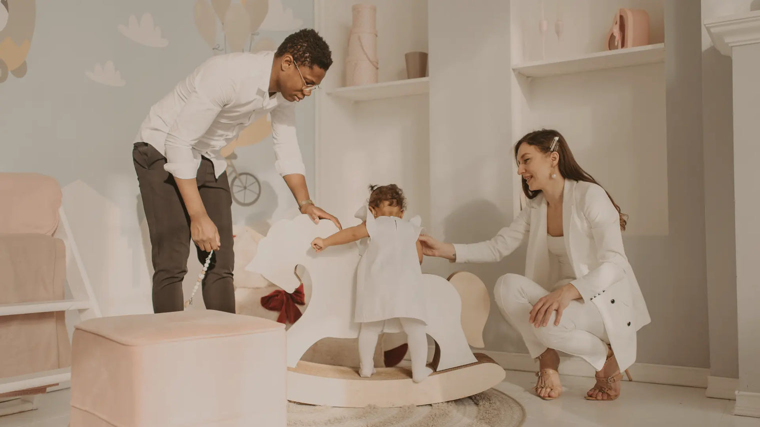 Parents practicing Montessori parenting with their daughter
