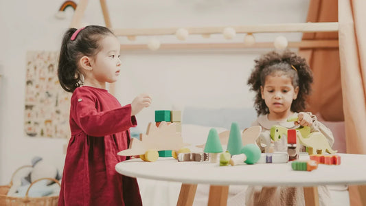 Two children playing in a Montessori playroom