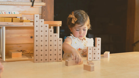 Child with a learning difference using number blocks