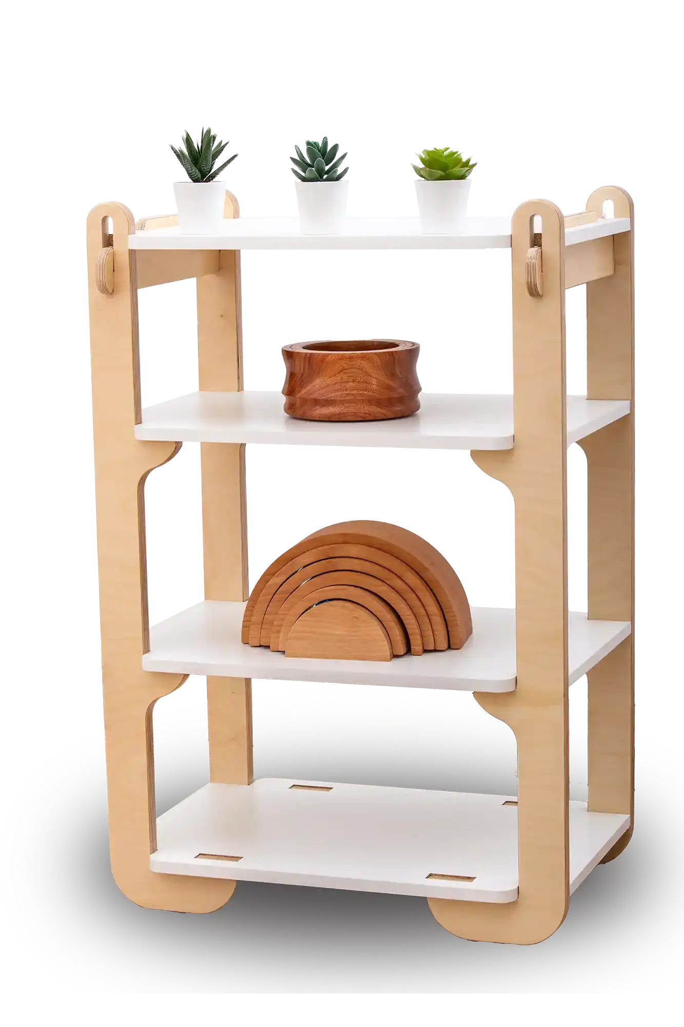 A modern four-tier wooden shelf isolated on a black background, featuring clean lines and a simple, child-friendly design. The top three shelves are adorned with a trio of small, potted succulents, adding a touch of greenery. The middle shelf holds a rustic clay pot, and the lower shelf displays a wooden rainbow toy, with its arches neatly nested together, combining functional storage with playful decoration.