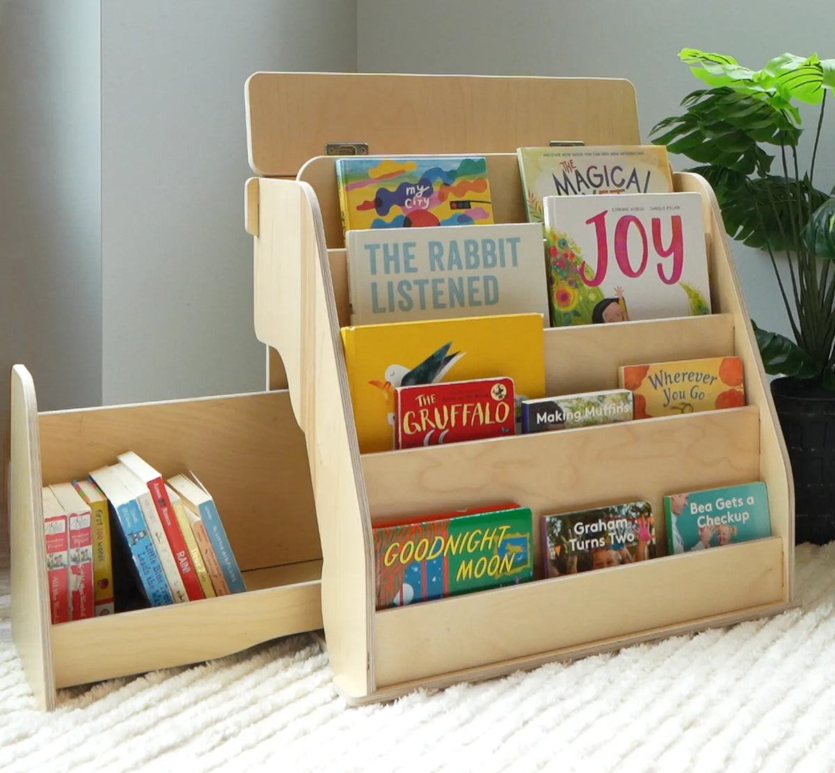 showing the montessori bookshelf and its hidden storage