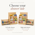 Load image into Gallery viewer, Two light wood bookshelves shown on a clean off-white background, with large text reading 'Choose your drawer side' and labels indicating left-side drawer and right-side drawer orientation. The shelves are styled with children's books inside, and smaller text at the top says 'Made to fit your room.
