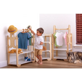 Load image into Gallery viewer, Boy playing with toy dinosaur next to stylish wooden clothes racks filled with children's clothes and accessories, accompanied by a friendly dog
