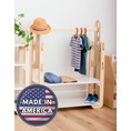 Load image into Gallery viewer, Made in America wooden clothing rack, featuring a stylish straw hat, a blue and white striped shirt, a teal tunic, casual denim jeans, and trendy blue sneakers. Perfectly blending form and function for kids' room organization, this rack showcases sustainable craftsmanship and support for American manufacturing
