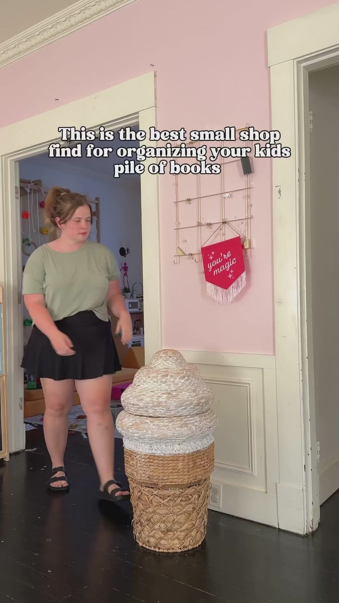 showing extra storage in our montessori bookshelf